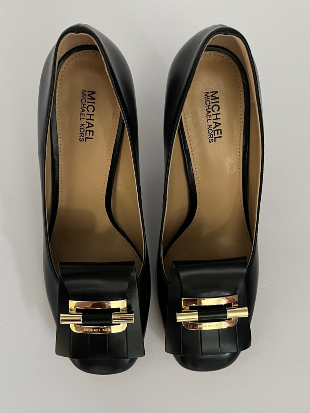Michael Kors Gloria Kiltie Fringe Leather Pumps in Black with Gold-Tone Buckle